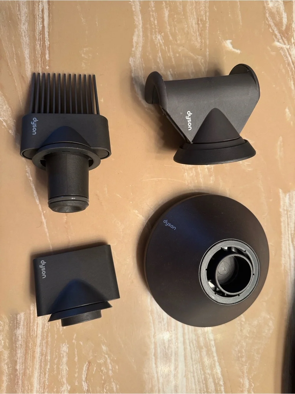 Four Dyson attachments for you hair dryer - all new without box